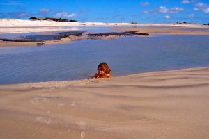 My son enjoying a pool on the beach