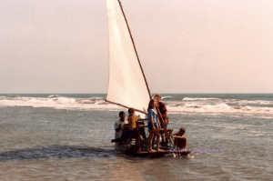 Neu taking the children for a sail in the shallows. Feb 2002