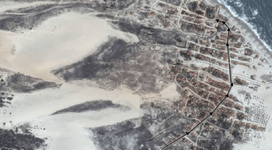 The tarmac road (in black) through the village 