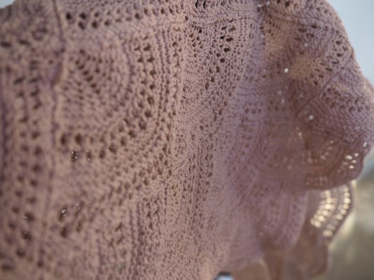 Advocado dyed shawl. Photo taken out of doors after washing and drying.