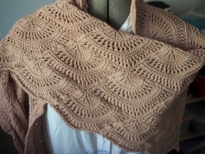 Advocado dyed shawl. Photo taken indoors.