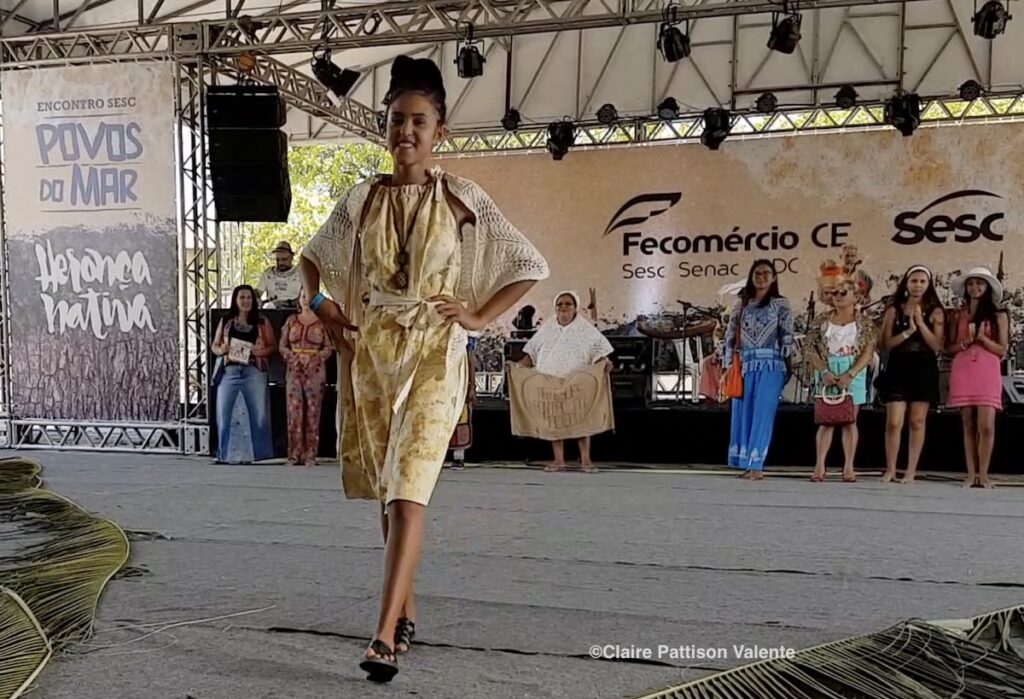 Young woman modelling at a fashion show for SESC Povos do Mar