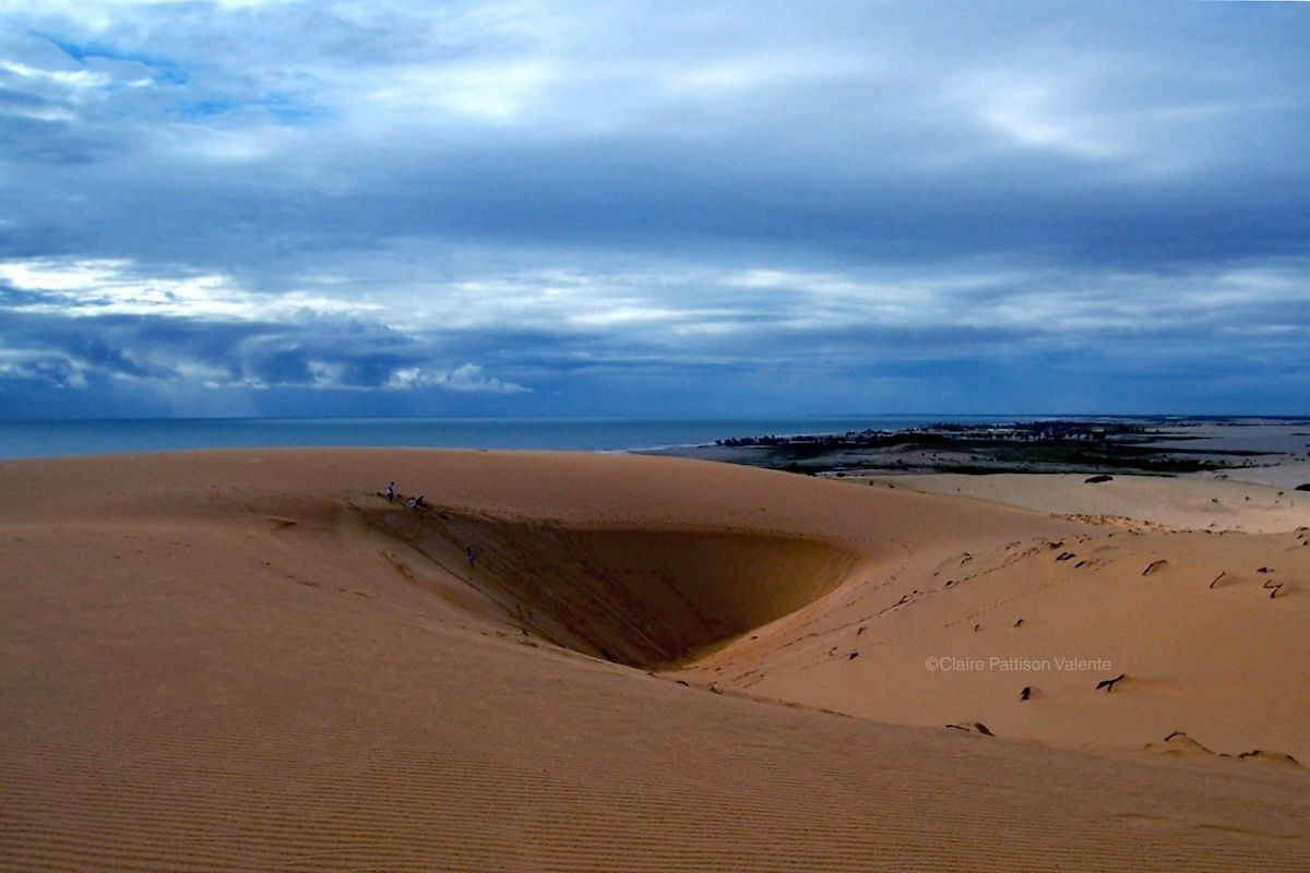 High dune with Prainha do Canto Verde beach in the distance.