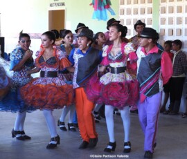 Young people in costume dancing in the Junina festival